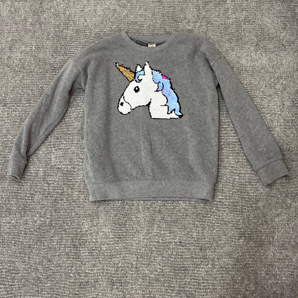 Sequence flipping unicorn sweater